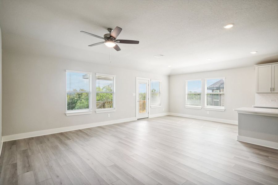 Living room in the Preston floorplan at a Meritage Homes community.