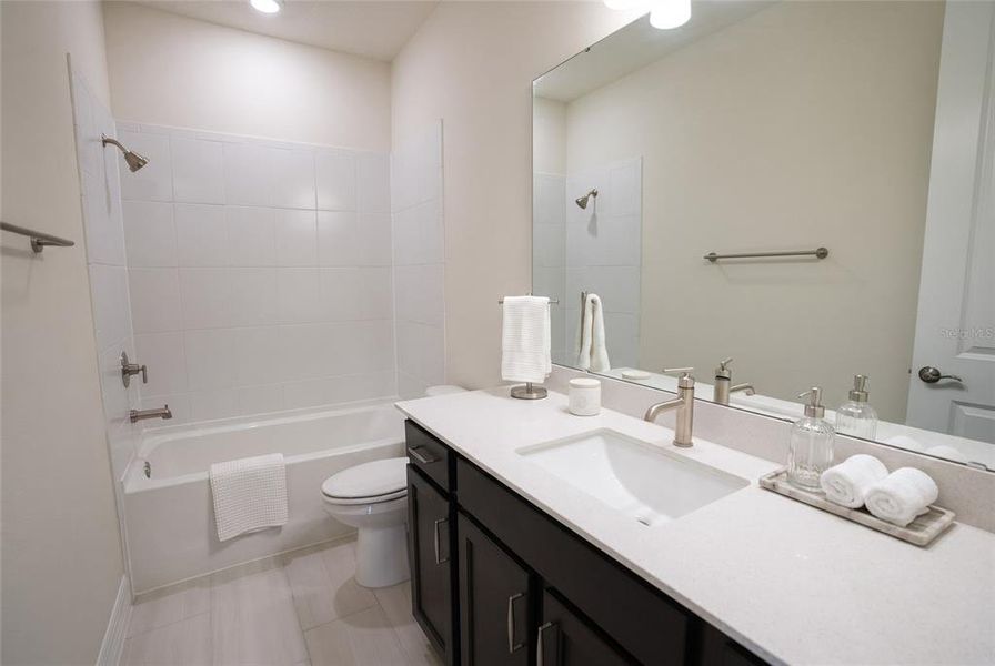 Furnished interior view inside a new home in Parkview Reserve, Orlando (Image 29).