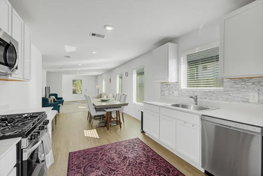Furnished interior view inside a new home in Pinewood at Grand Texas: Colonial & Cottage Collections, New Caney (Image 5).
