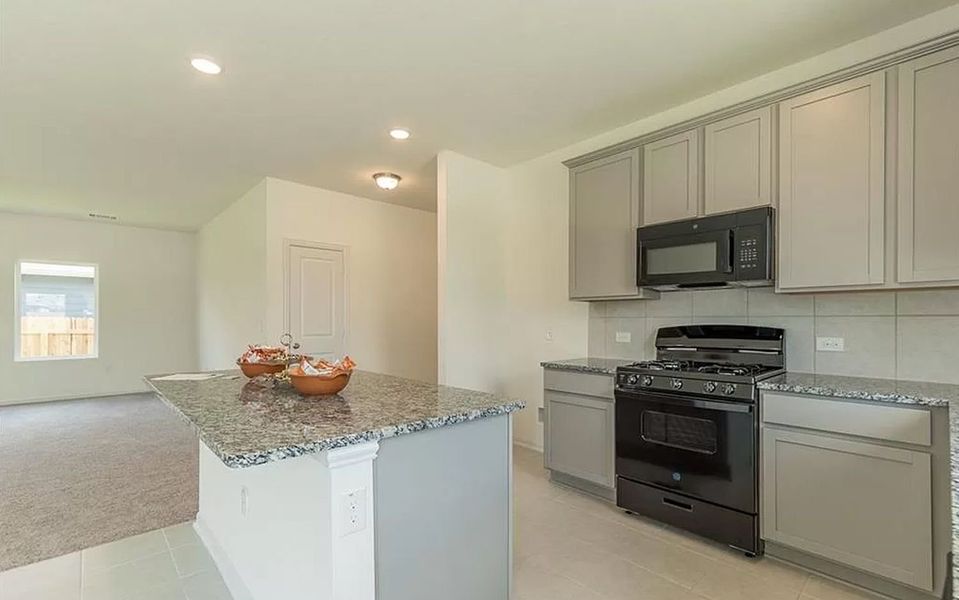 Furnished interior view inside a new home in Brooklands, Hutto (Image 6).
