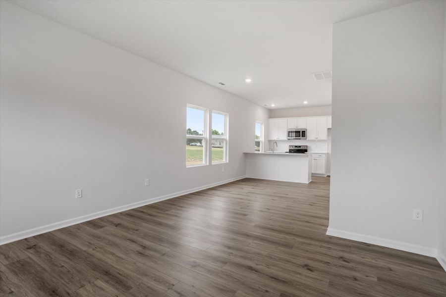Spacious, unfurnished interior of a new home in Cambridge Reserve, Angier (Image 14).