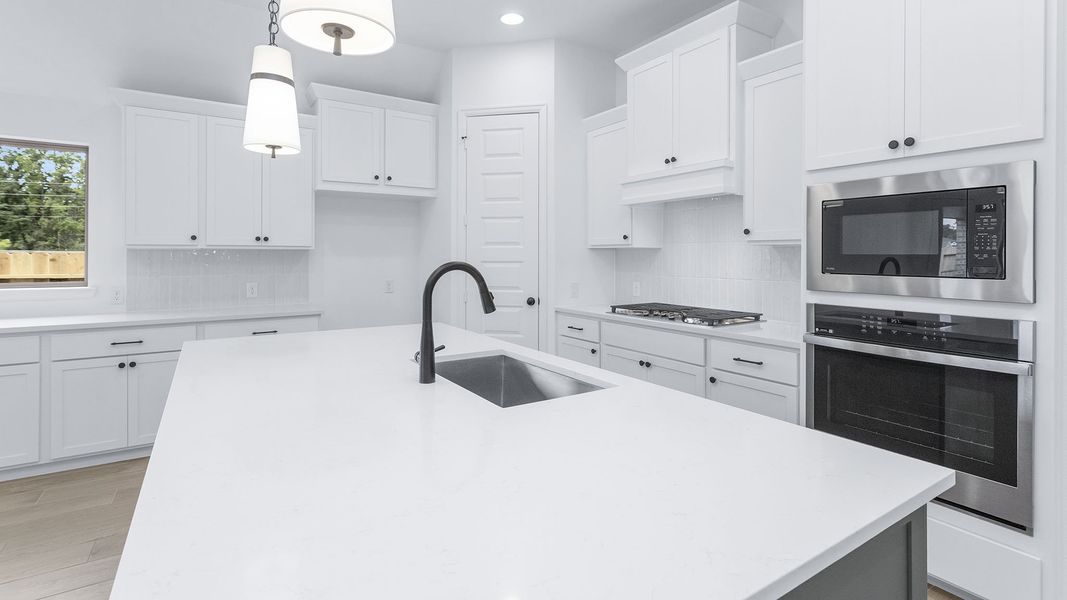Furnished interior view inside a new home in Evergreen, Conroe (Image 8).