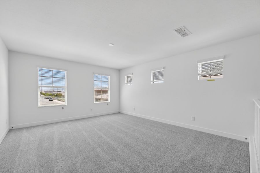 Spacious, unfurnished interior of a new home in La Mira, Mesa (Image 19). Spacious, unfurnished interior of a new home in La Mira, Mesa (Image 19).