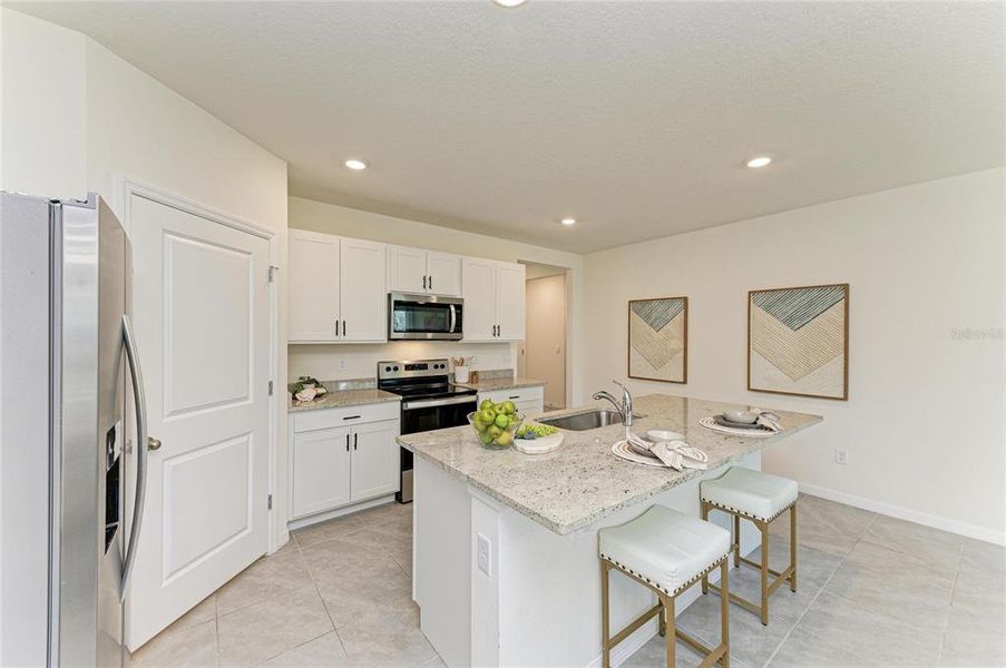 Furnished interior view inside a new home in Rye Crossing, Parrish (Image 12).