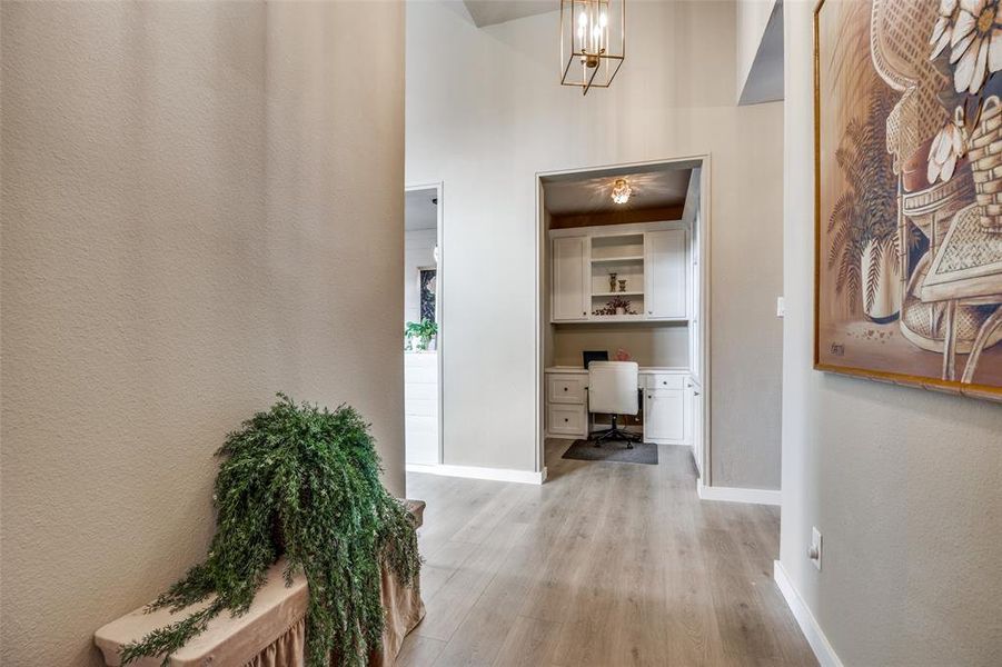Front Entry looking into Office with Built in Desk and Bookcases