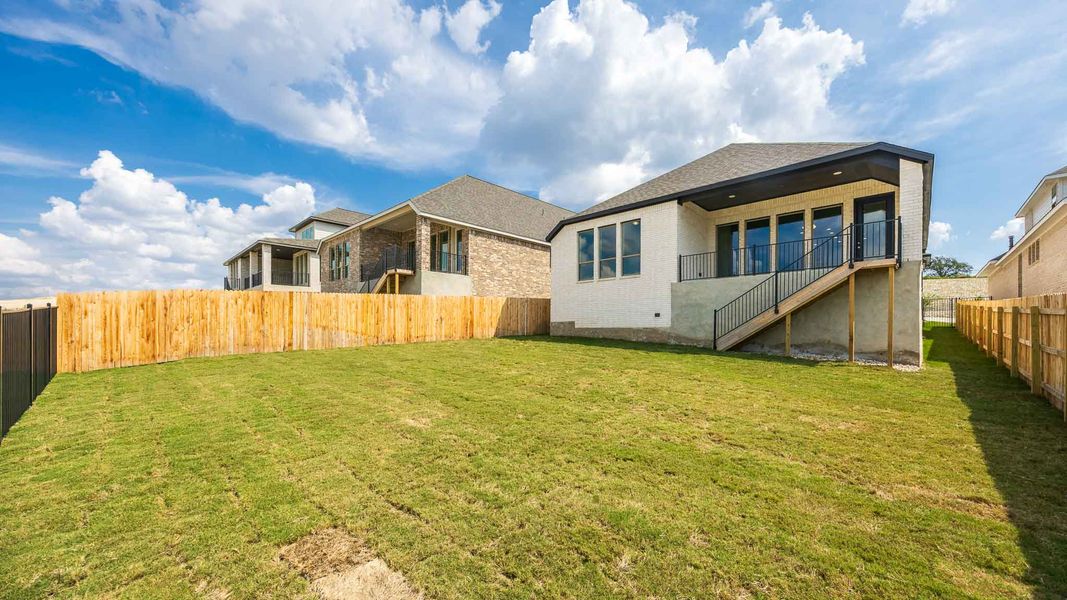 Exterior details and patio area of a home in Eldorado At Santa Rita Ranch 50', Liberty Hill (Image 2).