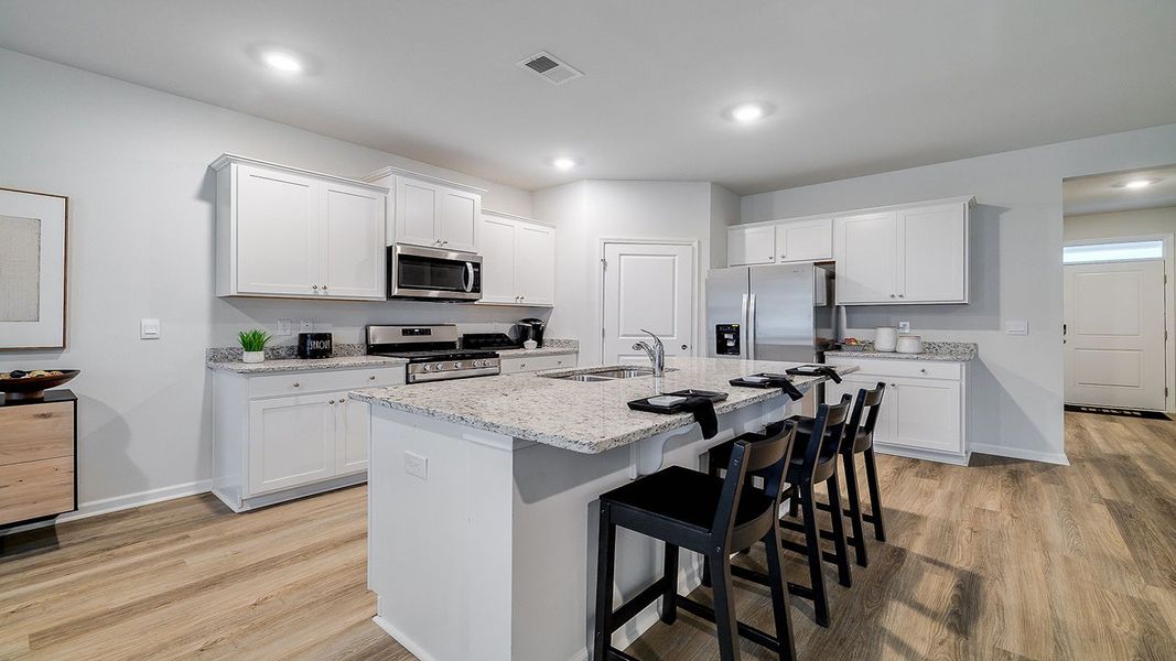Furnished interior view inside a new home in The Lakes at North Glynn, Brunswick (Image 9).