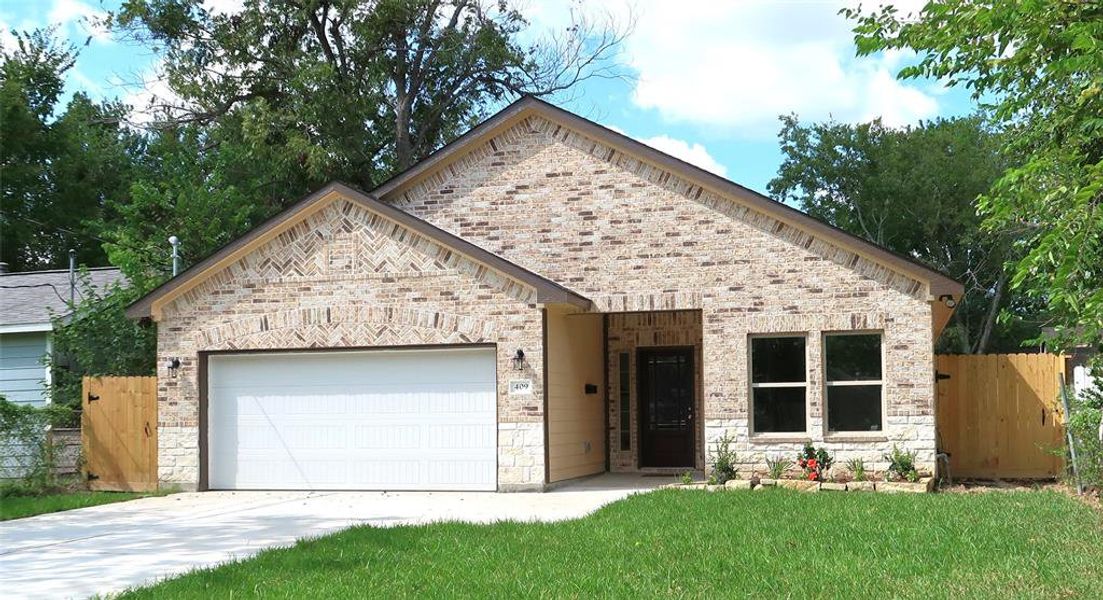 Front view of brick and stone masonry work.