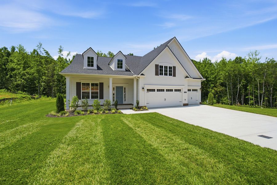 Front exterior of a new home in Aden Woods, Fairview, TN, highlighting curb appeal (Image 2).