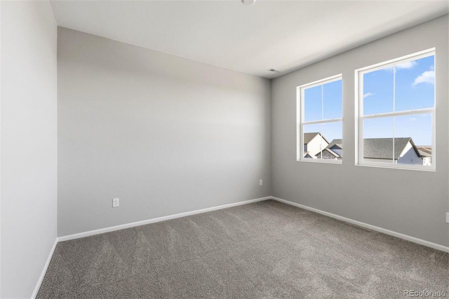 Spacious, unfurnished interior of a new home in The Estates Collection at Talon Pointe, Thornton (Image 32).