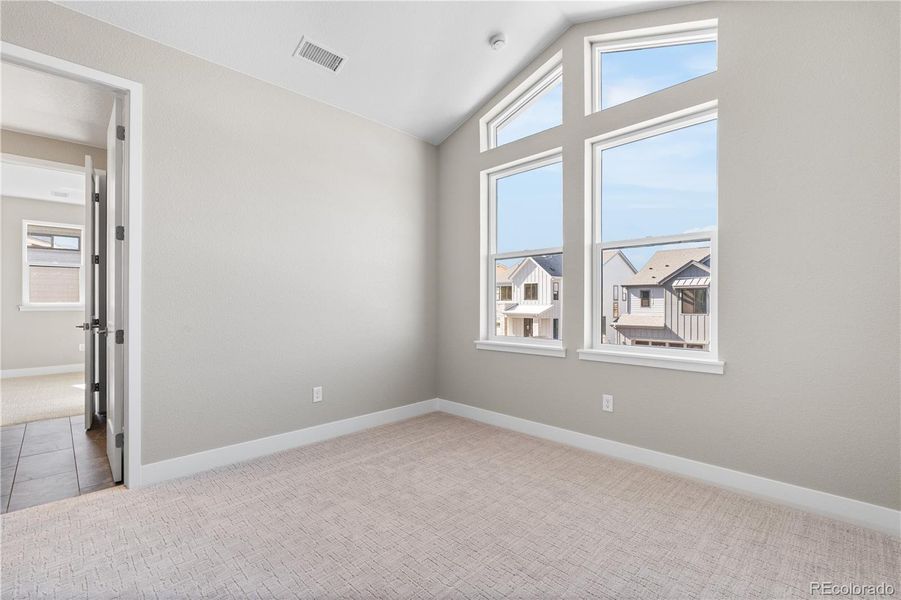 Spacious, unfurnished interior of a new home in Legends at Lyric, Lone Tree (Image 29).