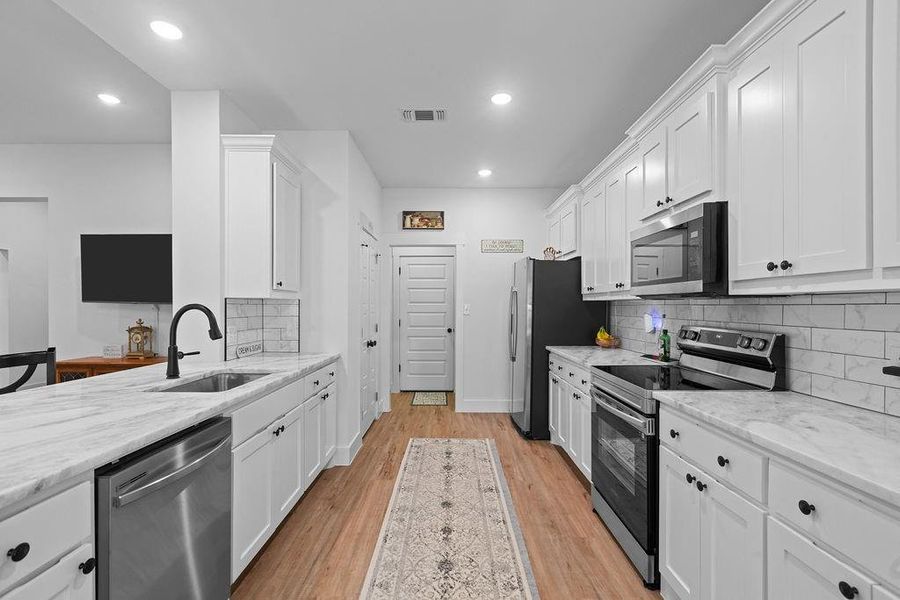 Furnished interior view inside a new home in , Whitesboro (Image 21).