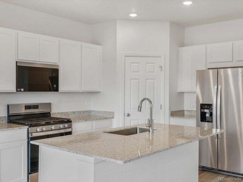 Furnished interior view inside a new home in Buffalo Highlands: The Flora Collection, Commerce City (Image 7).