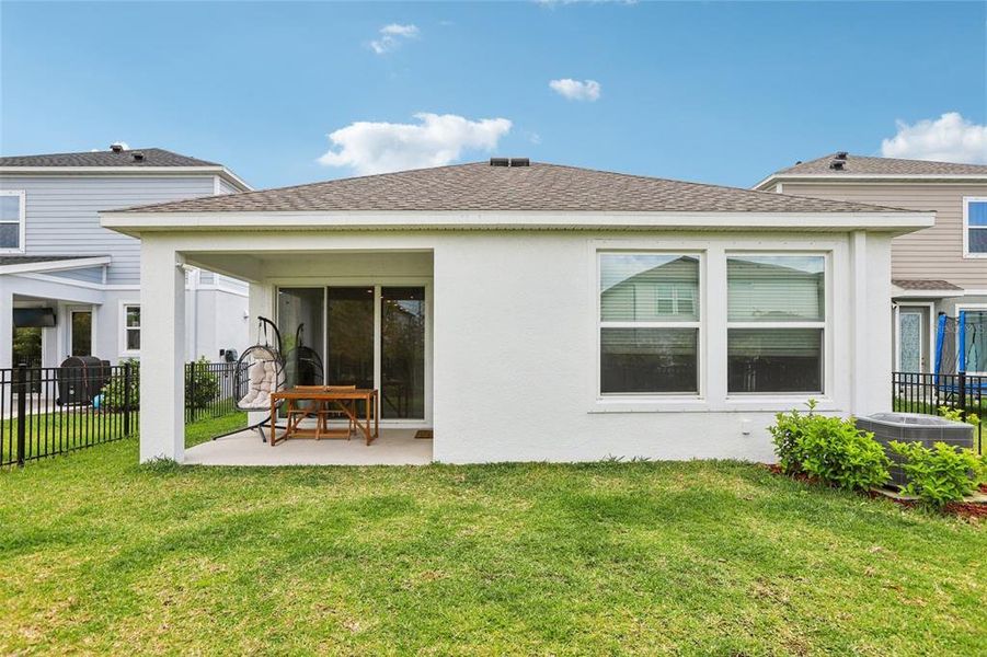 Exterior details and patio area of a home in Waterset Garden Series, Apollo Beach (Image 32).