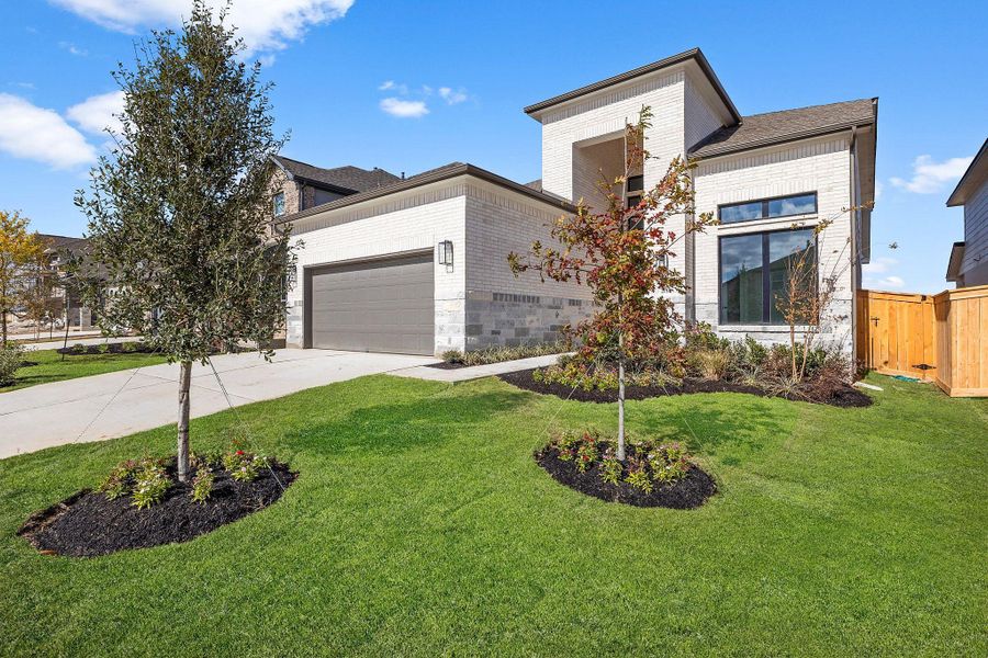 Front exterior of a new home in Nolina, Georgetown, TX, highlighting curb appeal (Image 20).