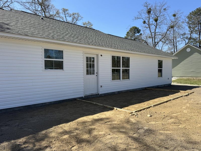 Exterior details and patio area of a home in , Hampton (Image 3).