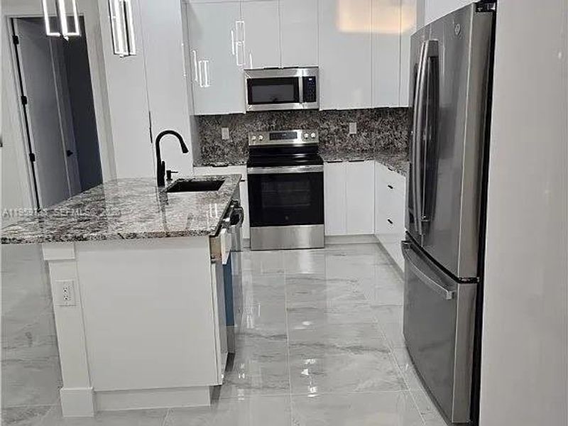 Furnished interior view inside a new home in , Lehigh Acres (Image 15).