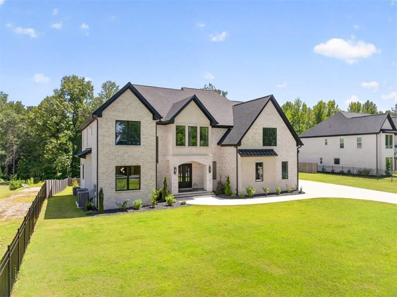 Front exterior of a new home in , Buford, GA, highlighting curb appeal (Image 26).