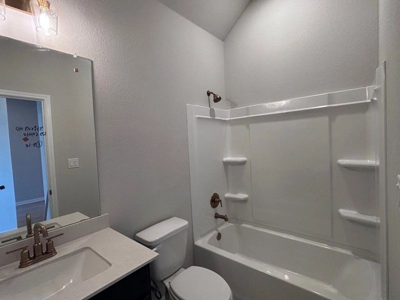 Furnished interior view inside a new home in The Colony, Bastrop (Image 5).