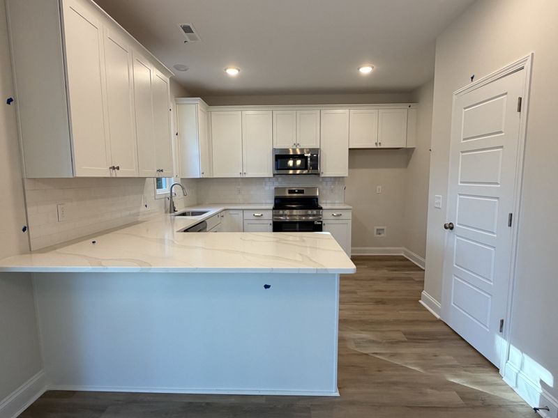 Furnished interior view inside a new home in Parkwood Estates, Leland (Image 12).