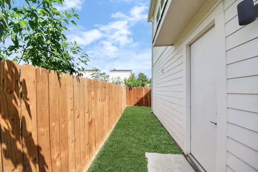 Exterior details and patio area of a home in , Houston (Image 3).