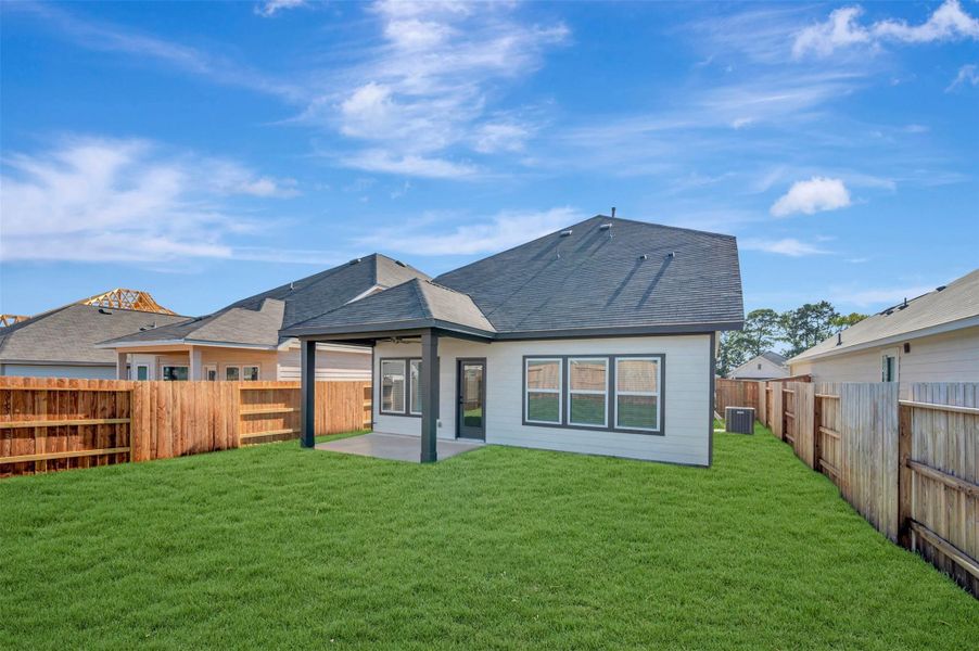 Exterior details and patio area of a home in Lone Star Landing, Montgomery (Image 25). Exterior details and patio area of a home in Lone Star Landing, Montgomery (Image 25).