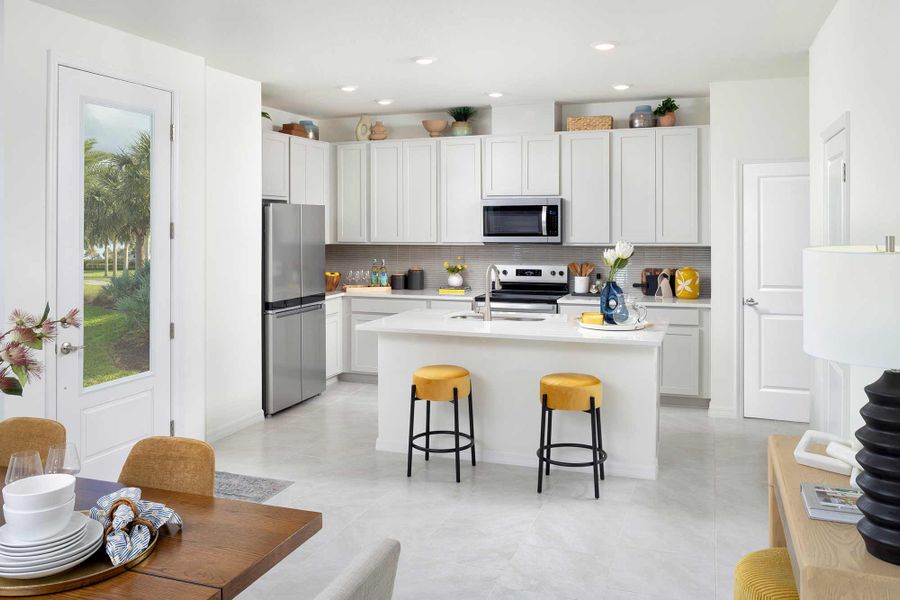 Furnished interior view inside a new home in Waterset Townhomes, Apollo Beach (Image 6).
