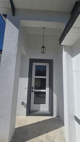 Exterior details and patio area of a home in , Citrus Springs (Image 4).