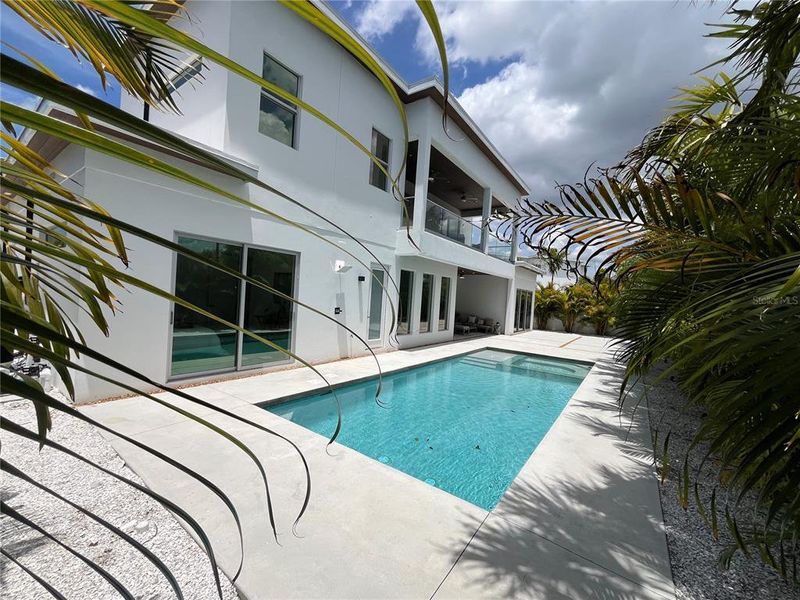 Exterior details and patio area of a home in , Sarasota (Image 3).