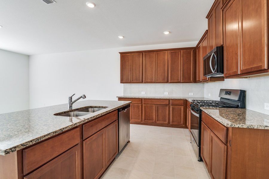 Furnished interior view inside a new home in Heartland Signature, Crandall (Image 5).