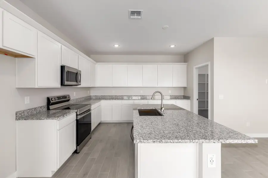 Furnished interior view inside a new home in Bentridge, Buckeye (Image 3). Furnished interior view inside a new home in Bentridge, Buckeye (Image 3).