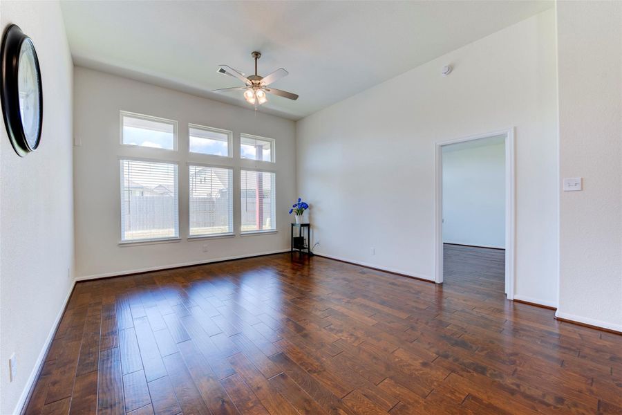 Spacious, unfurnished interior of a new home in Sunterra, Katy (Image 18).