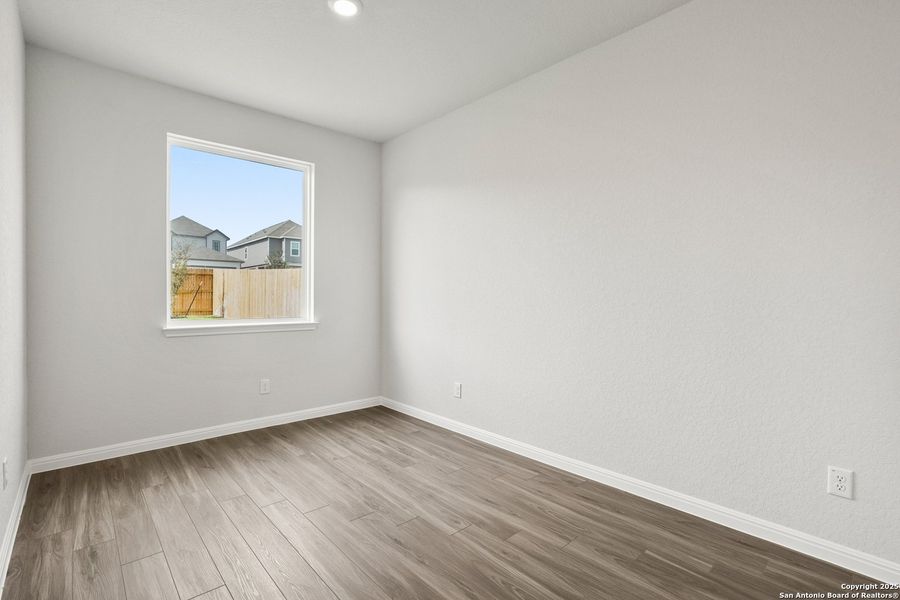 Spacious, unfurnished interior of a new home in Melissa Ranch, San Antonio (Image 23).