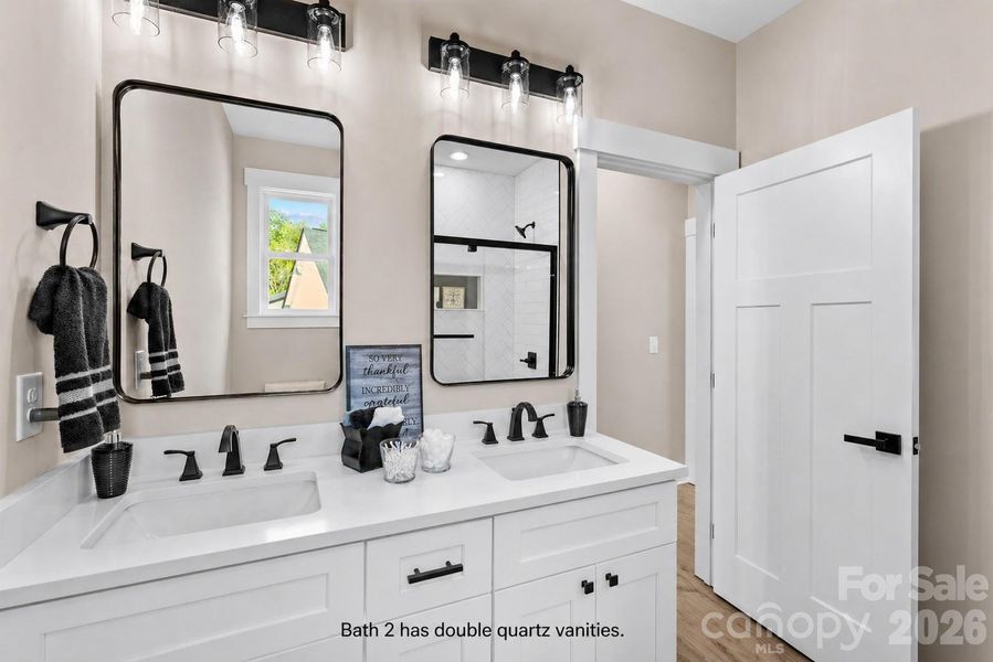 2nd fulll Bath also has dual vanities.