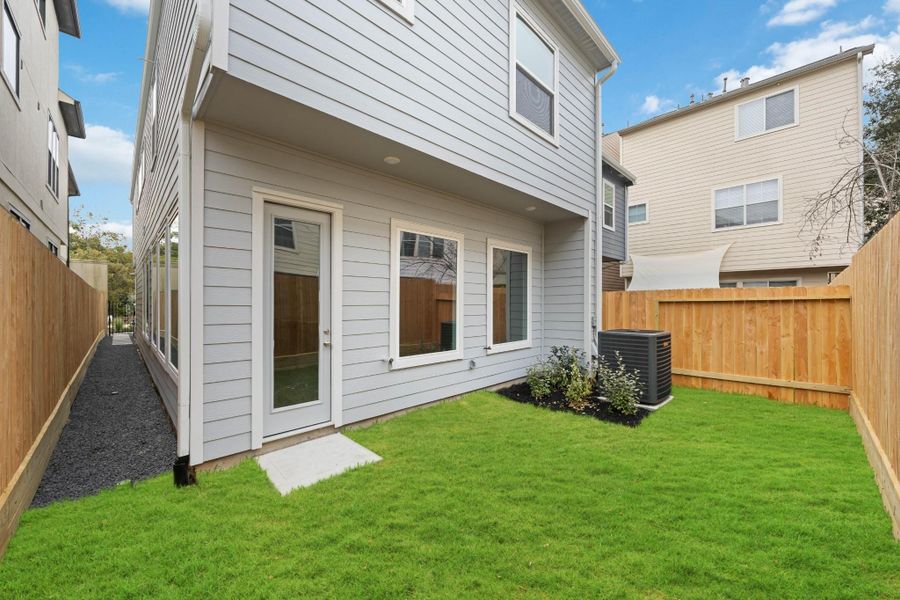 Clean Lines, Fenced In, Move-In Ready With a fully fenced backyard and a freshly landscaped lawn, this home makes outdoor living feel easy. Just add string lights and a bistro table.