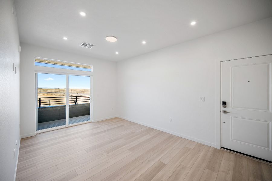 Spacious, unfurnished interior of a new home in Lyric at RidgeGate Condos, Lone Tree (Image 13).