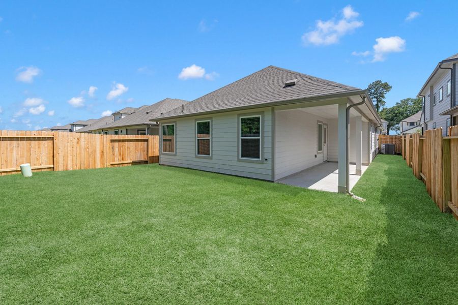 Exterior details and patio area of a home in Cypresswood Landing, Humble (Image 4).