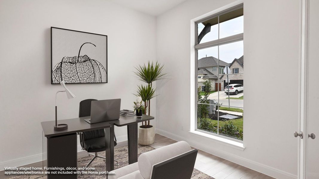 Office with baseboards and wood finished floors