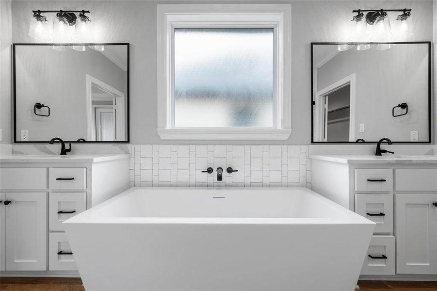 Full bath with two vanities and a freestanding tub Full bath with two vanities and a freestanding tub