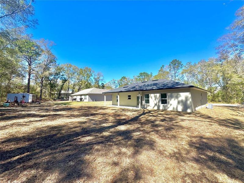 Exterior details and patio area of a home in , Citrus Springs (Image 24).