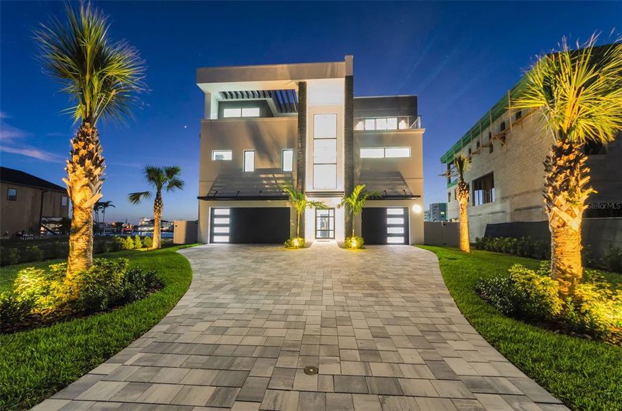 Front exterior of a new home in , Treasure Island, FL, highlighting curb appeal (Image 32).