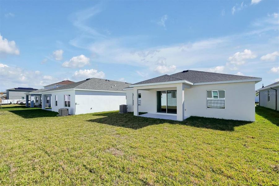 Exterior details and patio area of a home in Prairie Oaks, St. Cloud (Image 26).