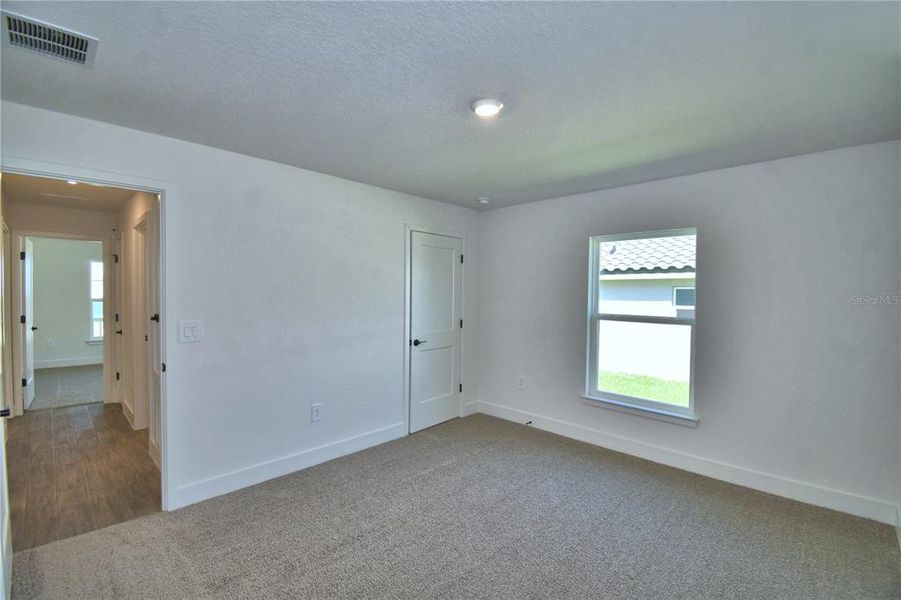 Spacious, unfurnished interior of a new home in Lake Juliana Estates, Auburndale (Image 21).