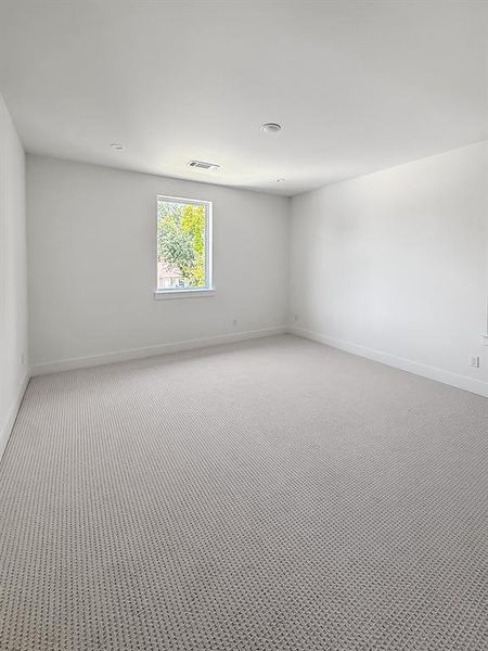 Unfurnished room with baseboards Unfurnished room with baseboards