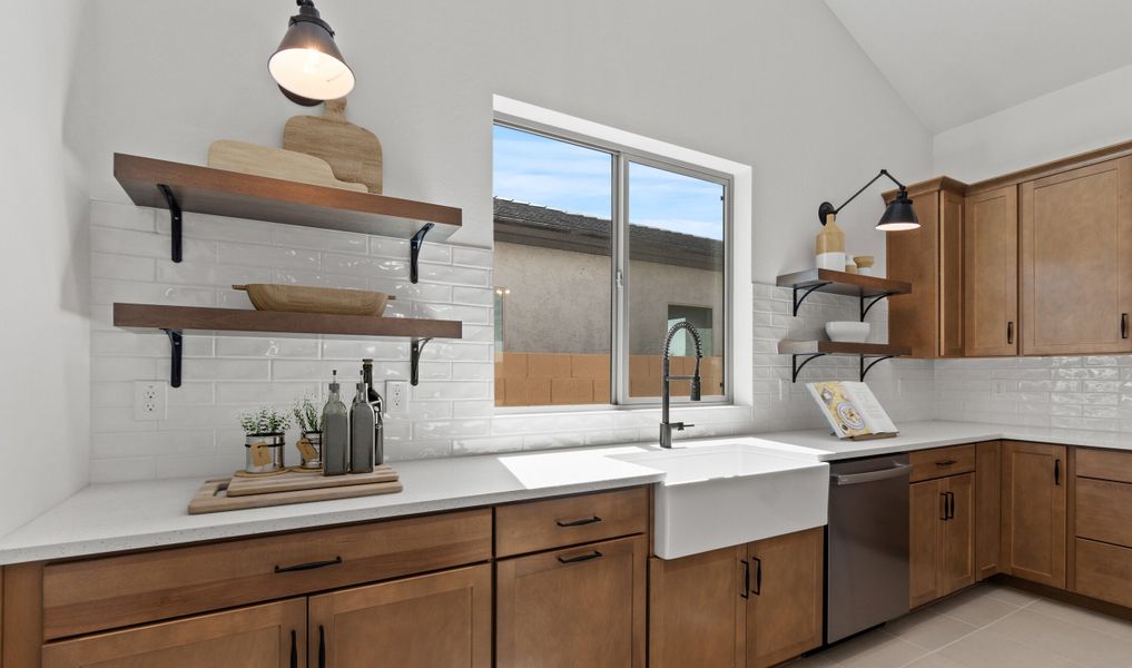 White artisan tile backsplash and floating shelves