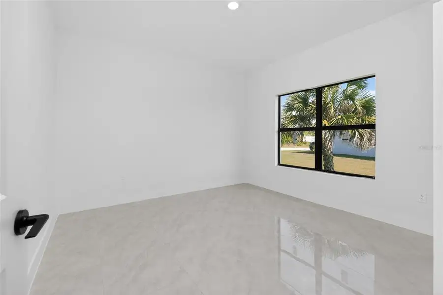 Spacious, unfurnished interior of a new home in , Port Charlotte (Image 60).