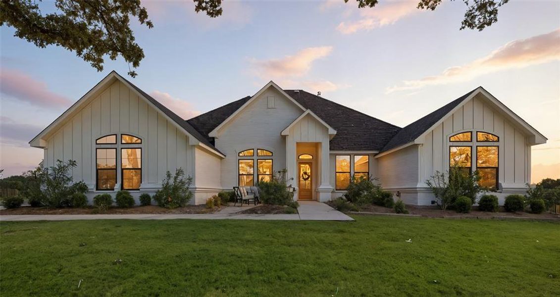 Front exterior of a new home in , Aledo, TX, highlighting curb appeal (Image 21).