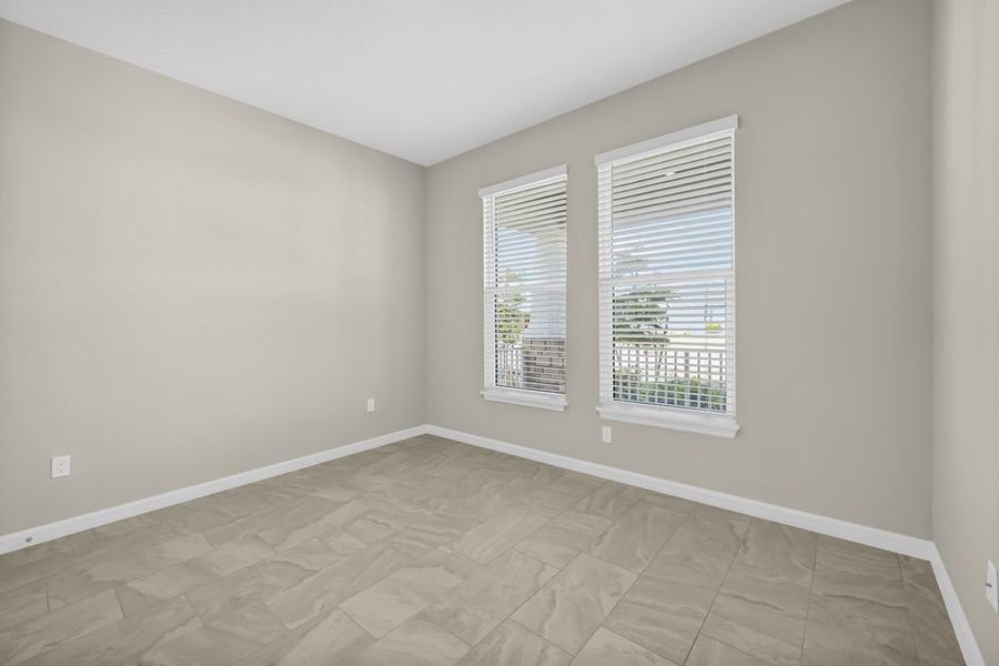 Spacious, unfurnished interior of a new home in Veranda Oaks, Port St. Lucie (Image 32).