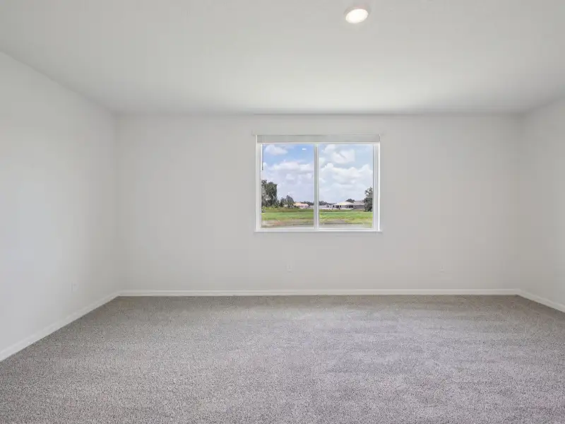 Spacious, unfurnished interior of a new home in Two Rivers - Signature Series, Zephyrhills (Image 10).