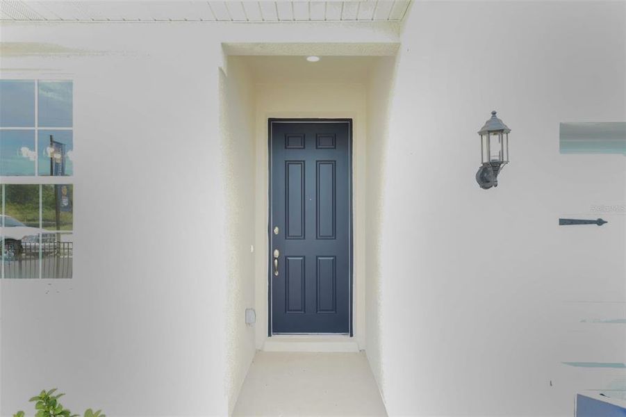 Exterior details and patio area of a home in Willowbrook North, Winter Haven (Image 23).